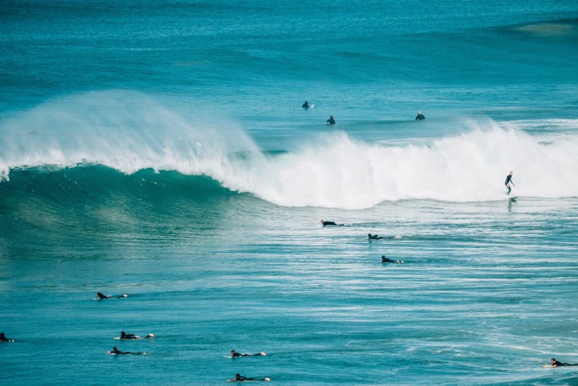 Surfers at Bar Beach in Merimbula, on Australia Day
